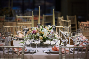 A luxurious covered table for the holiday in an expensive restaurant.