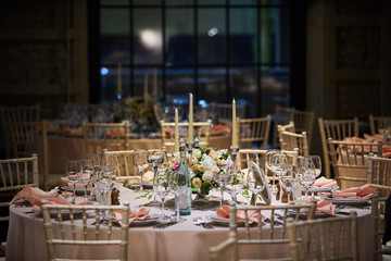A luxurious covered table for the holiday in an expensive restaurant.