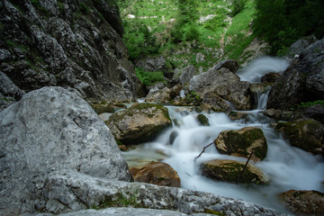 Naklejka na ściany i meble River Hammersbach flowing through alpine valley