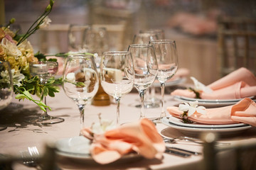 A luxurious covered table for the holiday in an expensive restaurant.