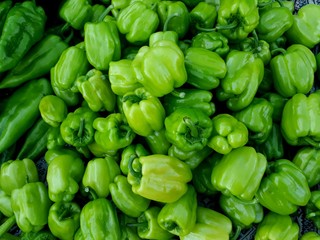 Obraz na płótnie Canvas green peppers on the market