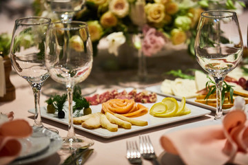 A luxurious covered table for the holiday in an expensive restaurant.