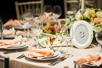A luxurious covered table for the holiday in an expensive restaurant.