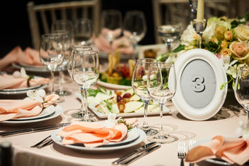 A luxurious covered table for the holiday in an expensive restaurant.