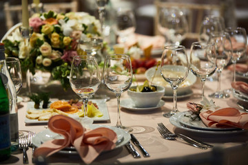 A luxurious covered table for the holiday in an expensive restaurant.