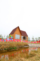 Colorful windmills and cabin pools