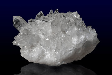 Quartz crystals, on the dark background - close up