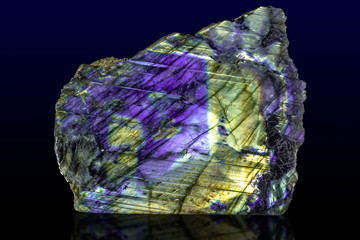 Beautiful shiny labradorite gemstone on white background