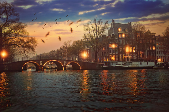 unique view of Amsterdam canals during sunset