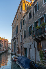 Old buildings in Venice. Canal view with boat. Travel photo. Italy. Europe.