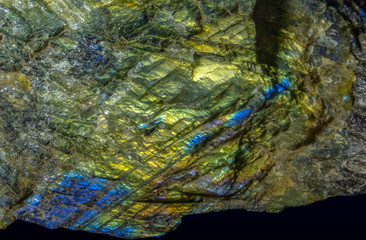 Macro shooting of gem raw natural Labradorite mineral texture as very nice natural background 