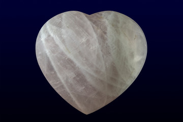 Tumbled and polished rose quartz heart - close up