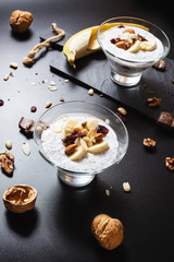 Chia pudding parfait puff with banana, yogurt and nuts