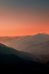 Fototapeta na wymiar Mountains Landscape. Beautiful Mountain peaks at sunset. .