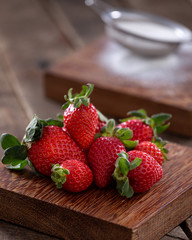 strawberries on wooden table