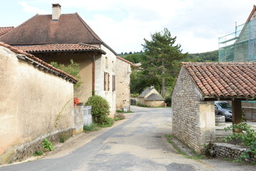 Fototapeta na wymiar ols houses and farms on a street in a Burgundian village