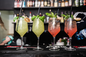 cocktails and soft drinks on the bar