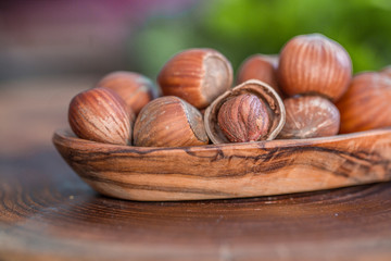 Close up of hazelnuts on wooden table