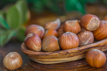 Close up of hazelnuts on wooden table