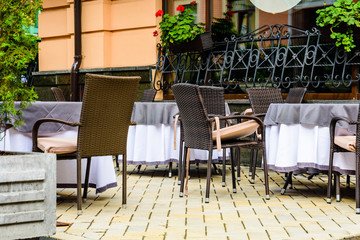 Chairs and tables in a cozy street cafe