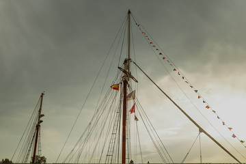 flag of countries in sailing boat traveling concept