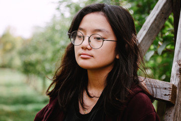 Portrait in nature of pre teenage girl