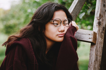 Portrait in nature of pre teenage girl