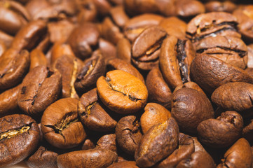 Coffee beans close up background. roasted coffee beans macro