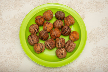 nuts on a green plate