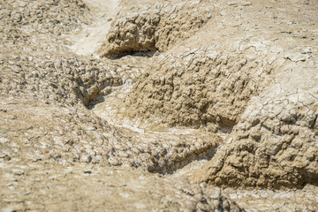 Cracked soil in Berca Mud Volcanoes area near Scortoasa village in Romania