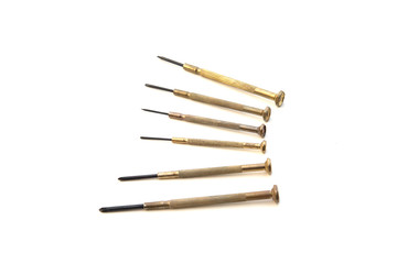 Small screwdrivers on white background