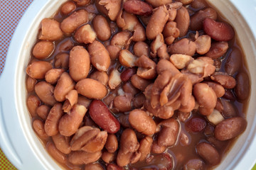 Top view of bowl with baked beans in the oven