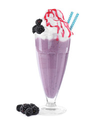 Tasty blackberry milk shake in glass on white background