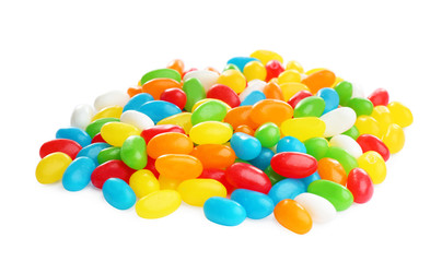 Pile of tasty colorful jelly beans on white background