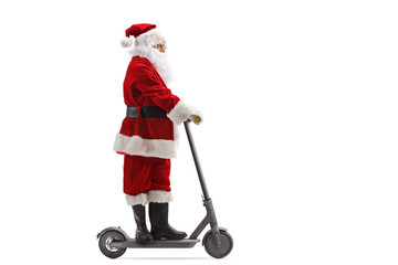 Santa Claus riding an electric scooter © Ljupco Smokovski
