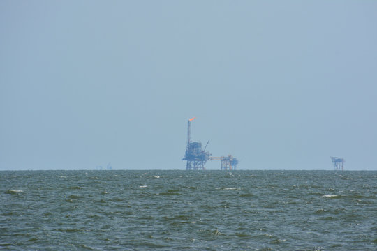 Oil Platform Near Shore In The Gulf Of Mexico