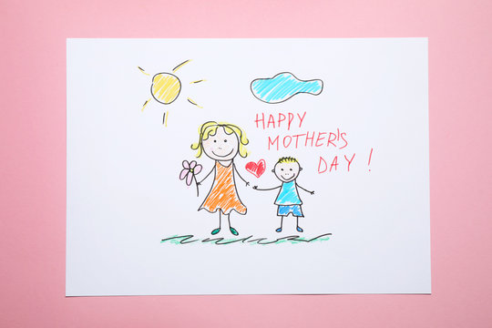 Handmade greeting card for Mother's Day on pink background, top view