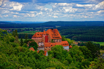 Fototapeta premium Beautiful sky with clouds over the ancient castle Burg Wernfels