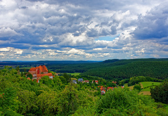 Fototapeta na wymiar Beautiful sky with clouds over the ancient castle Burg Wernfels