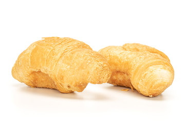 Group of two whole fresh baked mini croissant isolated on white background