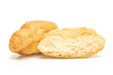 Group of one whole one half of fresh baked mini croissant isolated on white background