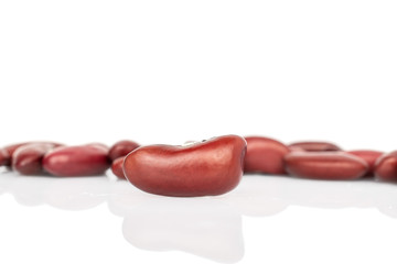 Lot of whole peeled fresh red kidney beans isolated on white background