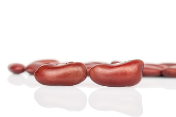 Lot of whole peeled fresh red kidney beans isolated on white background