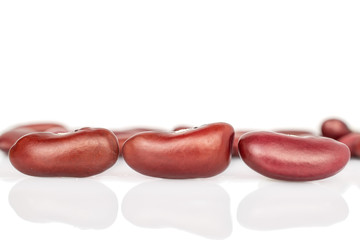 Lot of whole dried fresh red kidney beans isolated on white background