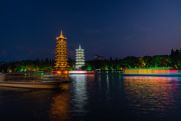 Sun and Moon Pagodas Towers at night