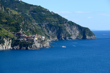 traditional village in Cinque Terre with Mediterranean Sea in the background