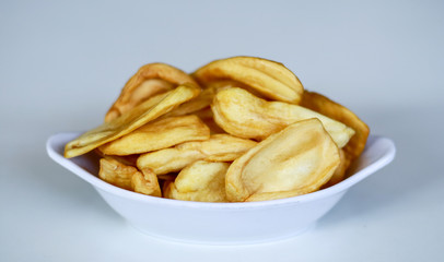 Jackfruit chips on white background.