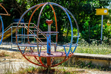 Old carousel Located in an outdoor amusement park