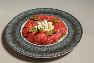 Beef carpaccio with fresh black truffle
