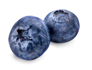 Obraz premium Blueberries with leaves isolated on white